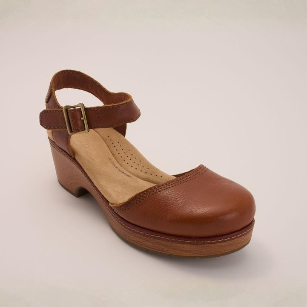 Zoccoli donna Nora con plateau, eleganti e comodi per un look casual chic quotidiano.