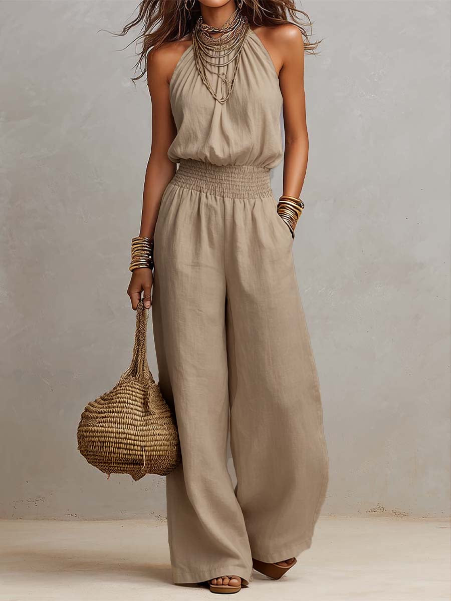 Tuta estiva elegante per donna, caratterizzata da scollo halter e pantaloni ampi per la massima comodità.