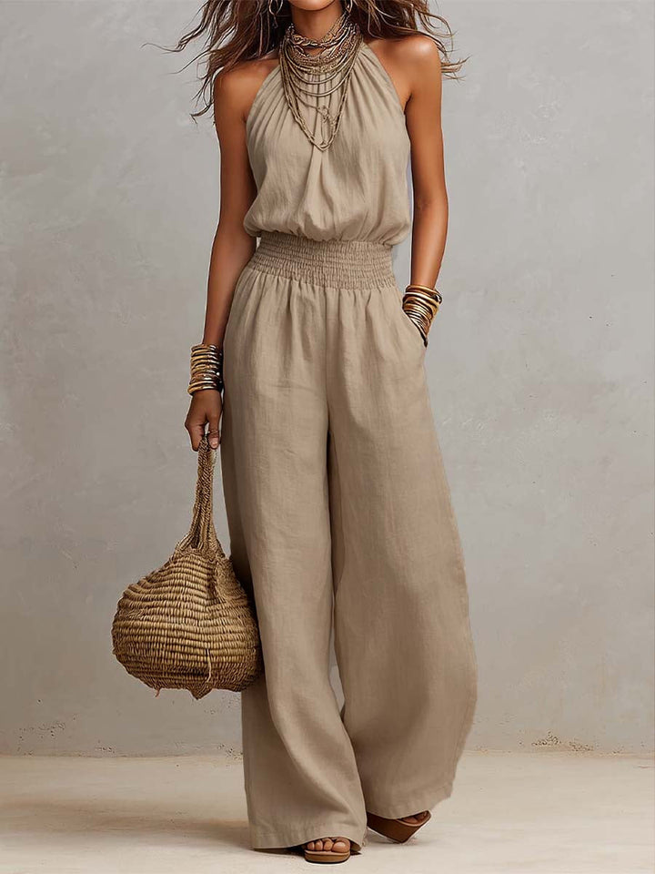 Tuta estiva elegante per donna, caratterizzata da scollo halter e pantaloni ampi per la massima comodità.