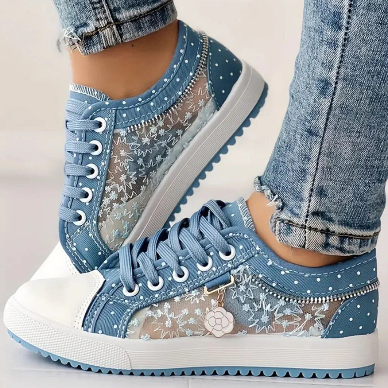 Sneakers donna blu con punta ampia e supporto plantare per massimo comfort quotidiano.
