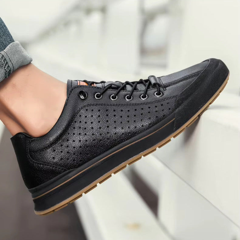 Sneakers casual da uomo, colorazione bianco-nera, versatili e comode, ideali per outfit urbani e quotidiani.