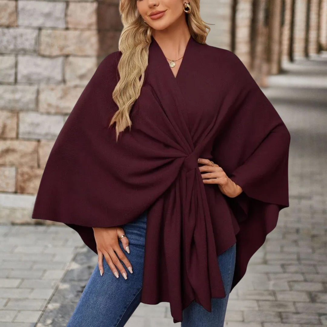 Abbigliamento moda: Poncho donna elegante con fiocco. Chic, comodo e versatile per ogni outfit.