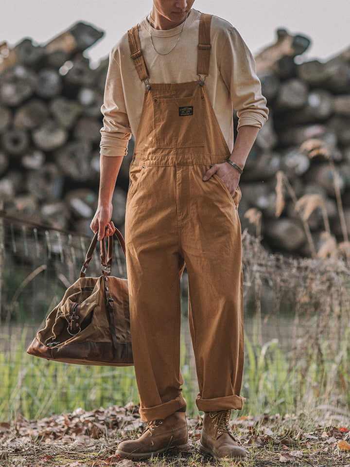 Tuta salopette unisex vintage, design resistente e comodo per ogni occasione casual.