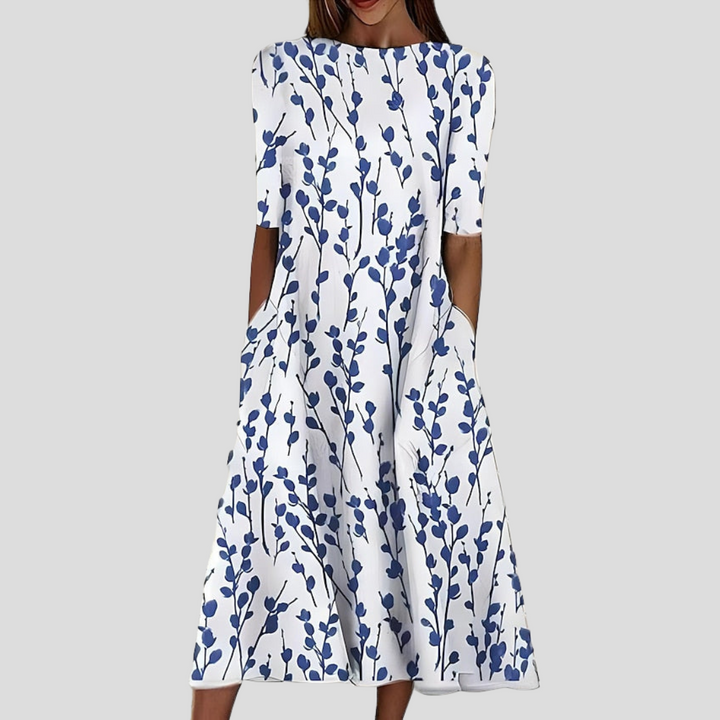 Abito estivo midi da donna con stampa floreale costiera, ideale per un look casual e confortevole.