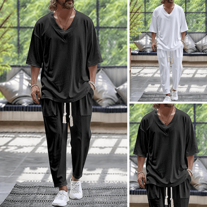 Set oversize invernale uomo nero, maglia a maniche lunghe e pantaloni coordinati per massimo comfort e relax.