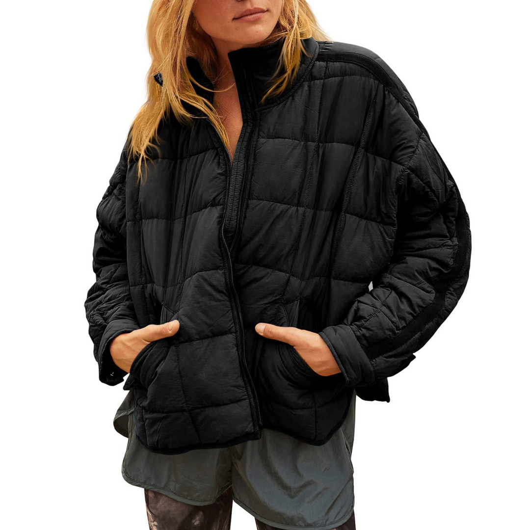 Giacca leggera trapuntata da donna con cerniera, ideale per primavera e autunno, stile casual.