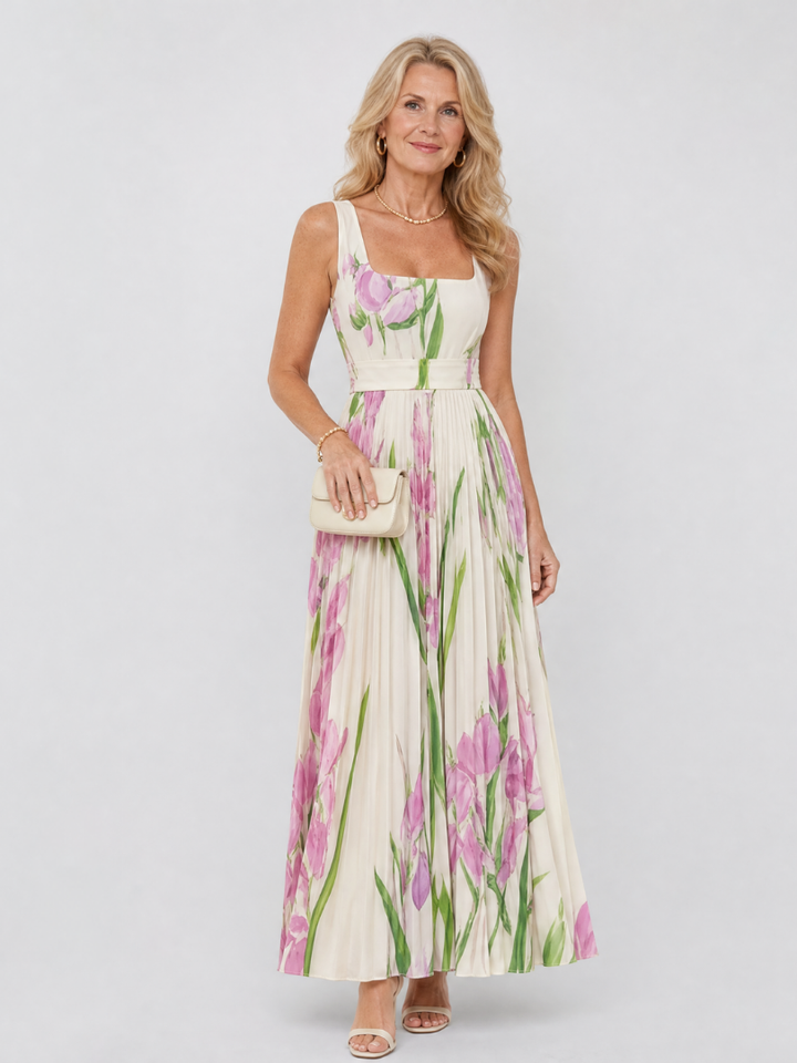Abito midi donna plissettato estivo con scollo quadrato. Perfetto per primavera ed eventi eleganti.