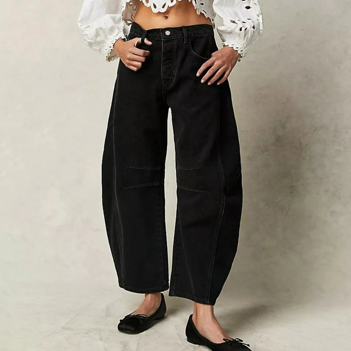 Pantaloni larghi da donna a vita alta, ideali per un comfort rilassato e stile casual elegante.