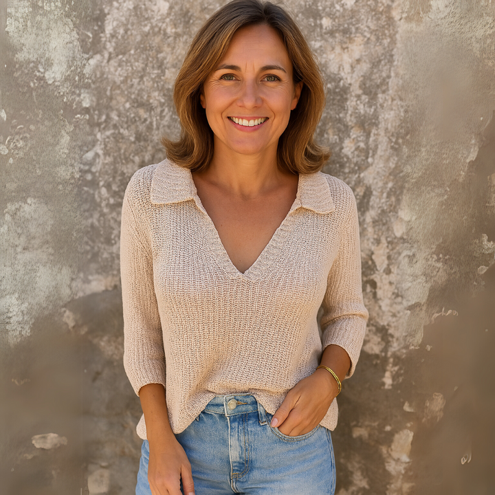 Maglione donna in morbido uncinetto con scollo a V, perfetto per un look casual elegante.