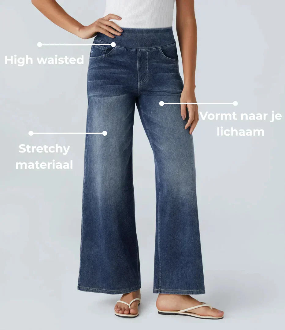 Jeans donna a vita alta con elastico, blu scuro, comfort e stile senza tempo.