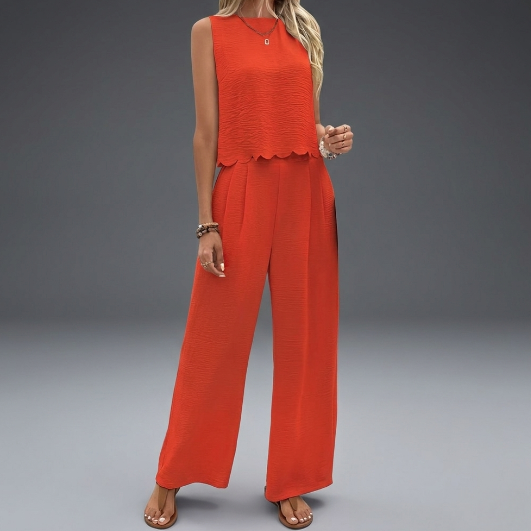 Completo donna estivo due pezzi: top senza maniche e pantaloni gamba larga. Comodo e chic per look vacanza.