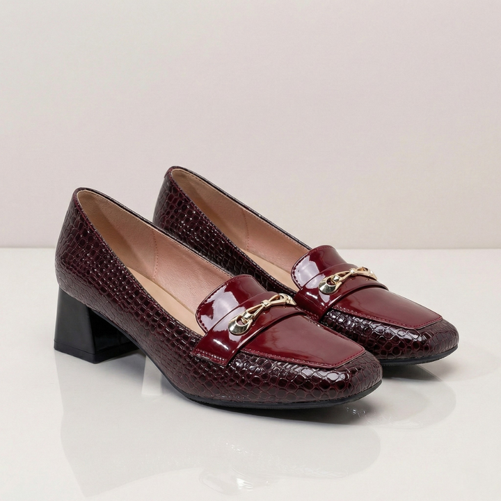 Scarpe décolleté donna onice con tacco largo e punta quadrata. Ideali per look eleganti, da ufficio a sera, offrono comfort.