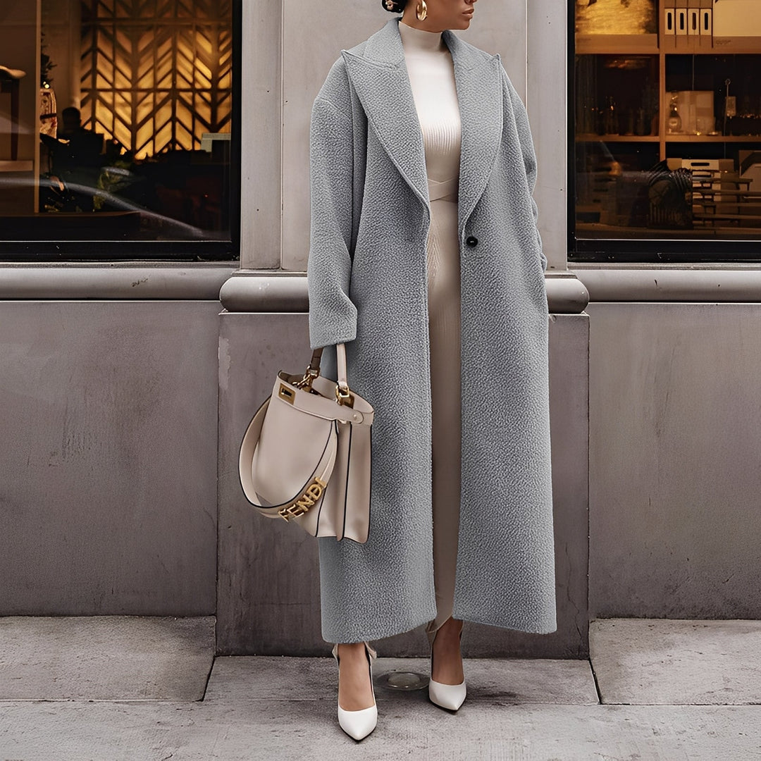 Giacca lunga monopetto da donna, taglio oversize, in vari colori per abbigliamento femminile raffinato.