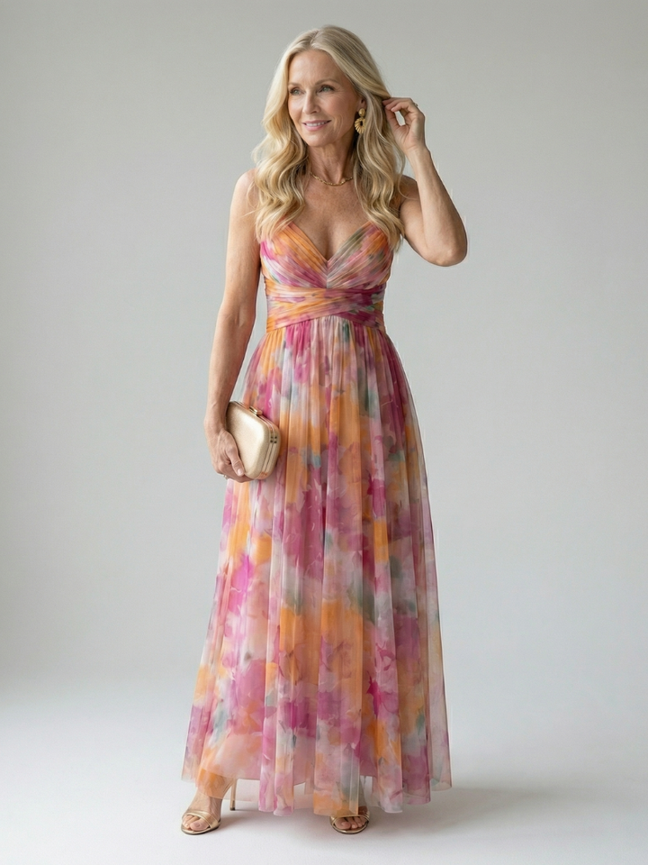 Abito maxi donna incrociato, fluido e leggero. Perfetto per un look estivo elegante e femminile.