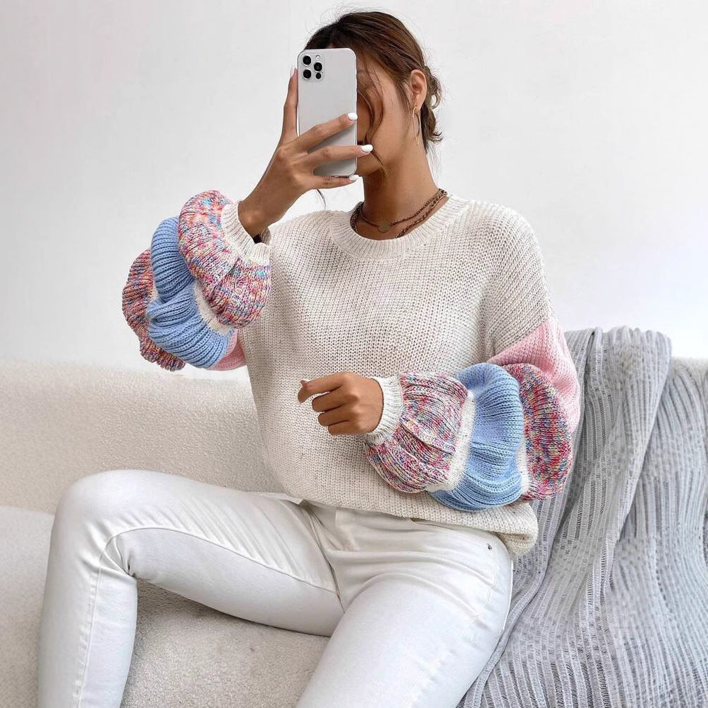 Maglione donna oversize girocollo colorblock crema e rosa con maniche a sbuffo. Perfetto per moda casual comoda.
