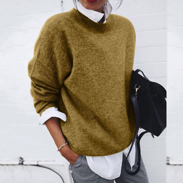 Maglia donna casual morbida, girocollo e maniche lunghe. Vestibilità comoda, ideale per outfit autunnali.
