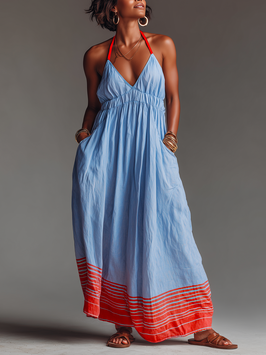 Abito maxi da donna estivo con scollo halter a righe blu e bianche e pratiche tasche laterali, moda donna.