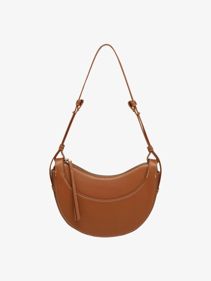 Borsa a tracolla curva da donna con nappina, perfetta per lo stile quotidiano ed elegante.
