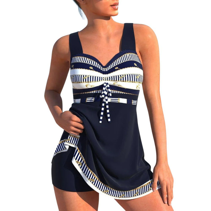 Costume intero donna marinaro blu notte con gonna chic. Perfetto per eleganza estiva e comfort in spiaggia o piscina.