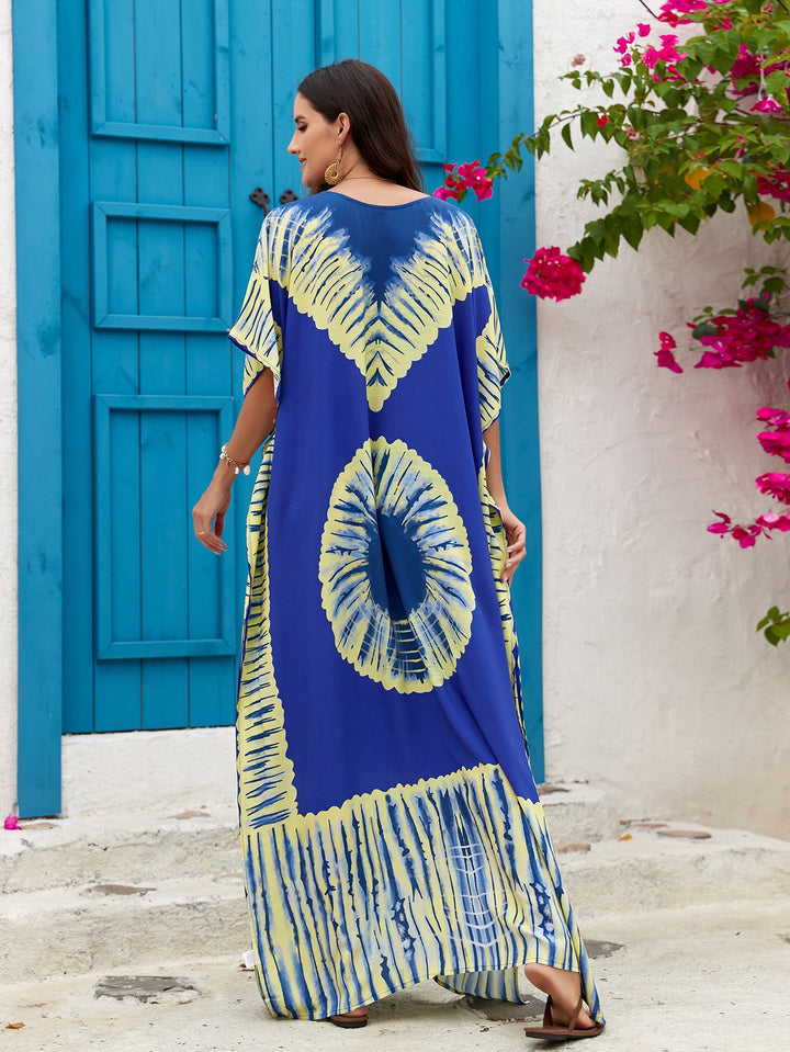 Abito lungo estivo con stampa floreale, scollo a V, leggero e ventilato per donna.