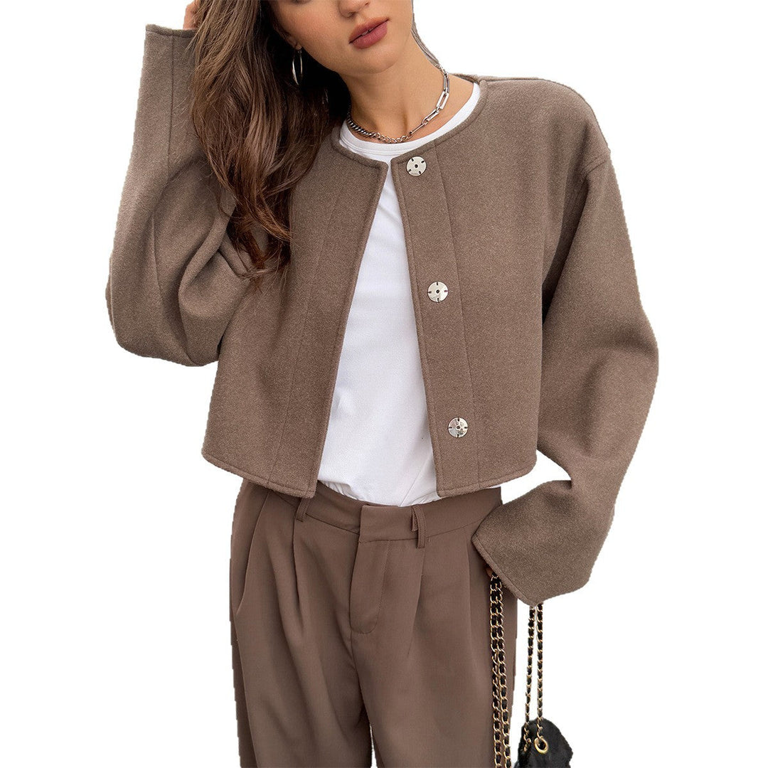Giacca corta elegante per donna, con maniche lunghe, capospalla versatile per un tocco chic in ogni occasione.