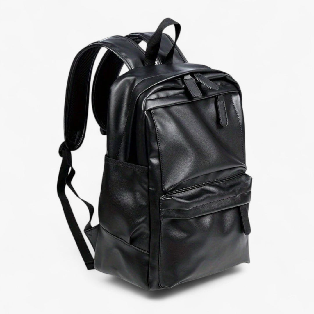 Zaino nero minimalista ed elegante da uomo, ideale per la città e il lavoro.