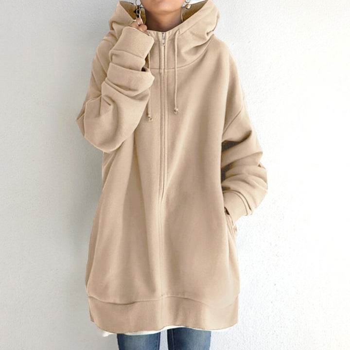 Felpa oversize da donna con cappuccio, stile relaxed per un look casual ed elegante. Ideale per comfort autunno inverno.