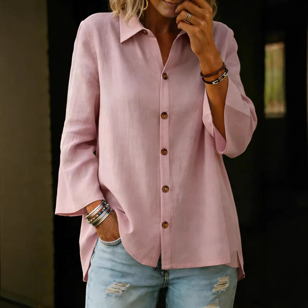 Camicetta donna abbottonata, tinta unita, manica tre quarti, ideale per outfit quotidiano.