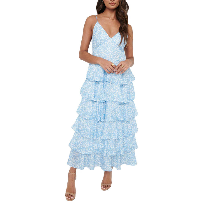 Elegante vestito estivo lungo donna con stampa foglie, perfetto per vacanze e serate casual chic.
