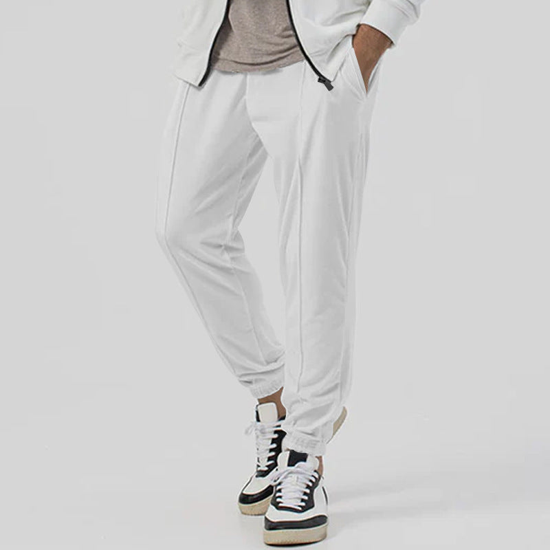 Pantaloni tuta uomo streetwear, vestibilità ampia e gamba affusolata, massimo comfort, vita media.
