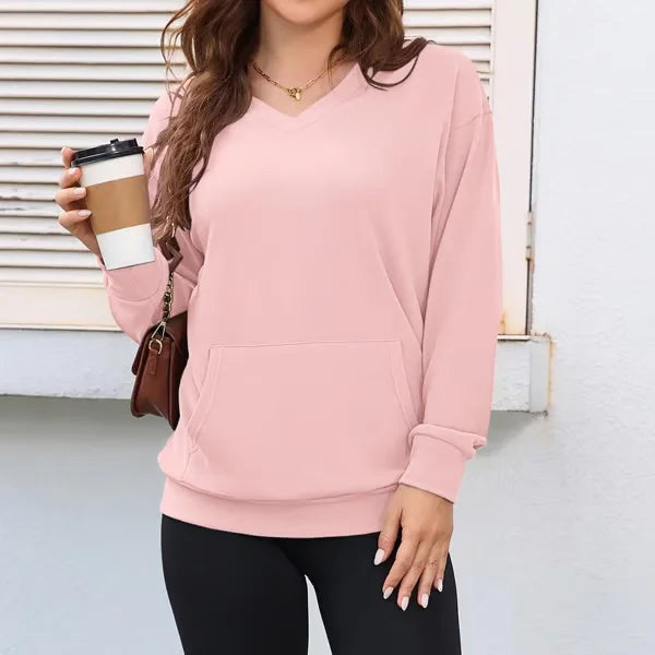 Dettaglio: tasca frontale su maglione donna pullover casual, abbigliamento femminile di moda comfort.