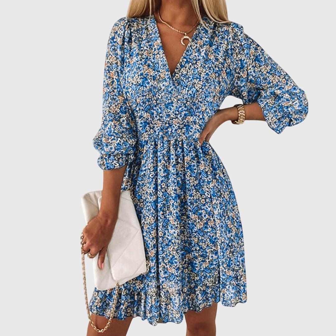 Vestito donna estivo floreale boho chic, maniche a sbuffo, ideale per un look casual e fresco.