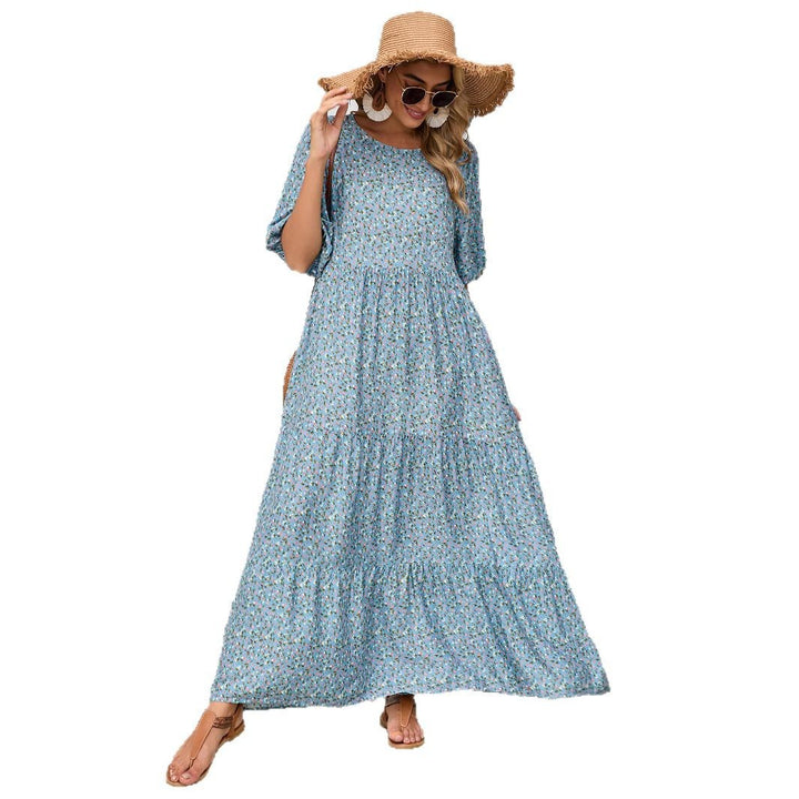 Splendido abito lungo estivo floreale azzurro da donna, stile boho chic. Maxi abito casual per un comfort estivo.