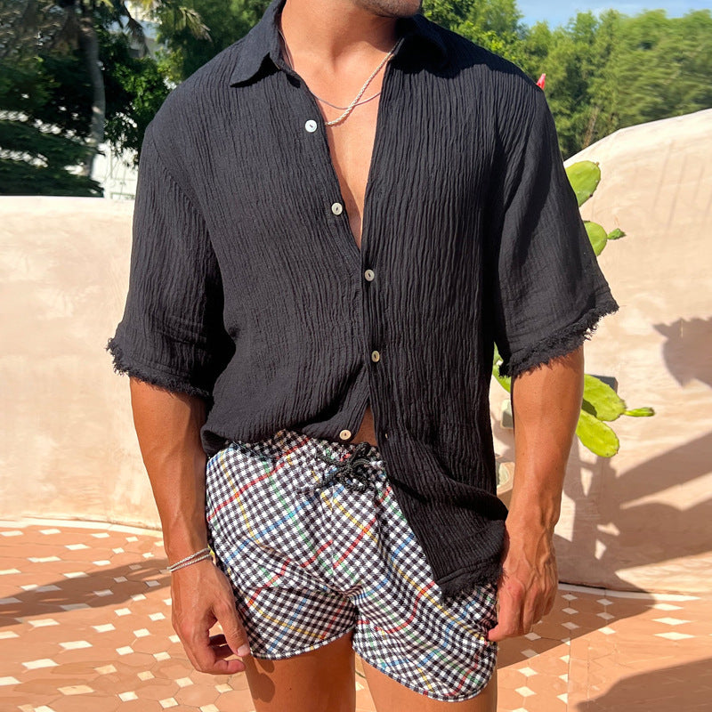 T-shirt estiva uomo beige. Maglietta a maniche corte con colletto a risvolto, vestibilità ampia, perfetta per il comfort casual.