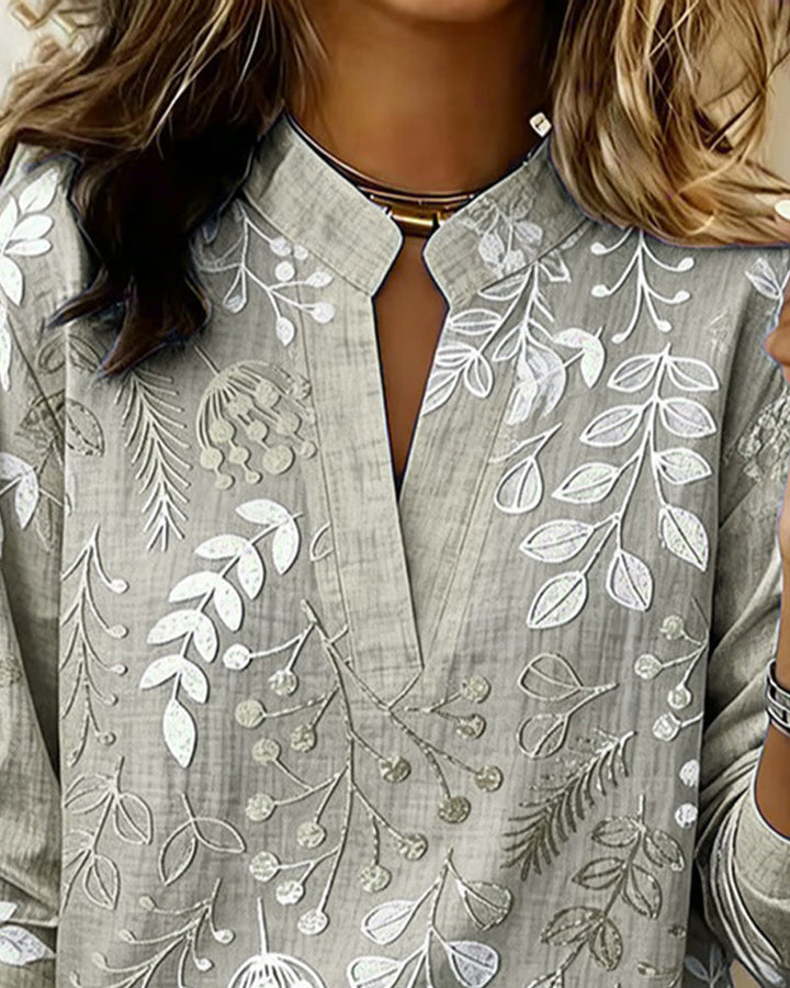 Blusa casual donna floreale, scollo a V e maniche tre quarti. Ideale con jeans o gonne in primavera/estate.