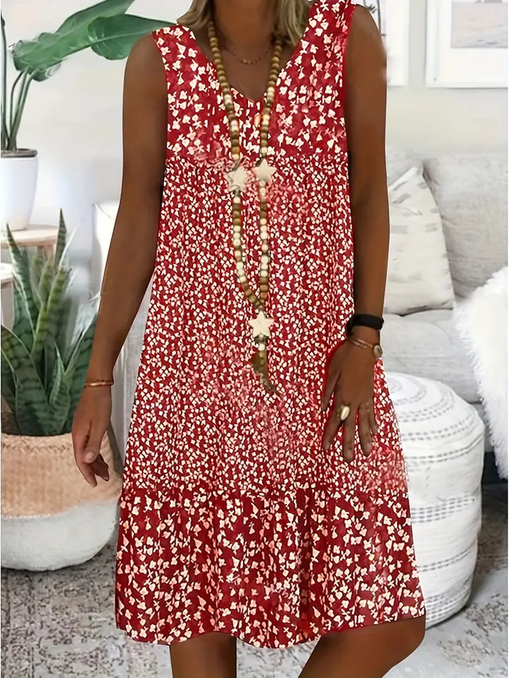 Abito midi estivo floreale da donna con scollo a V, perfetto per vacanze, spiaggia e look casual.