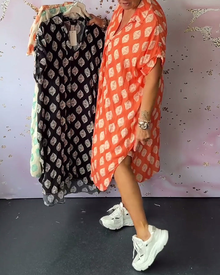 Vestito estivo midi donna con scollo a V, comodo e dai colori vivaci. Perfetto per la moda estiva.