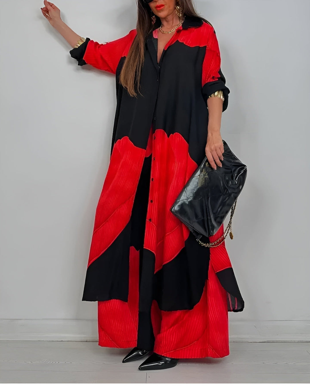 Completo donna coordinato elegante: camicia e pantaloni a gamba larga, perfetto per outfit ufficio o casual chic.