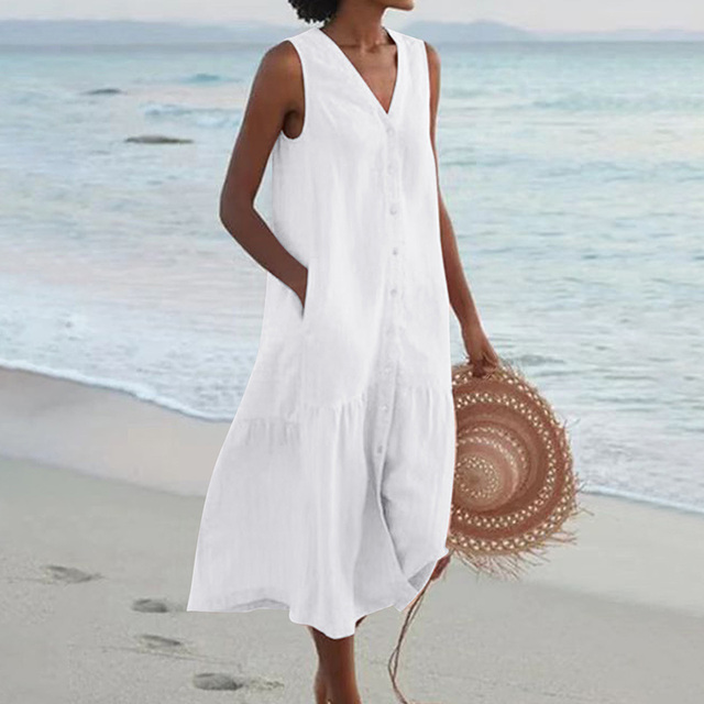Elegante abito estivo donna midi, senza maniche. Perfetto per un look casual chic e comodo.
