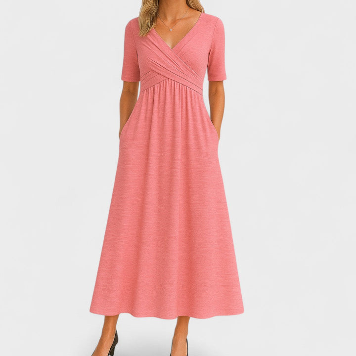 Vestito midi casual donna con scollo a V incrociato, tasche e gonna svasata. Perfetto per il giorno.