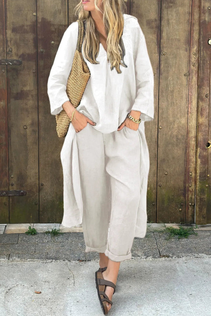 Completo tunica e pantaloni casual donna in lino traspirante, ideale per la moda estiva e relax.