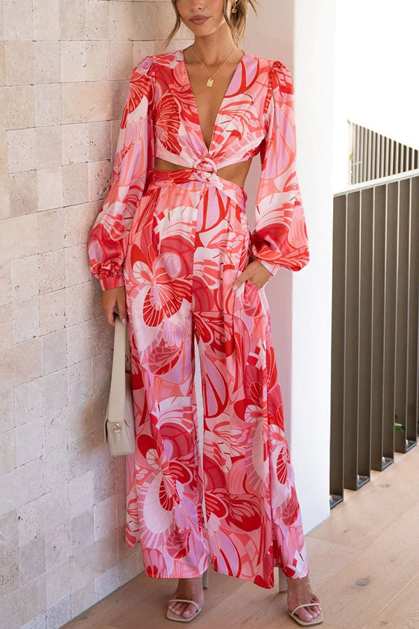 Moda donna: Tuta floreale chic con schiena scoperta, vita alta e stampa estiva, perfetta per primavera estate.