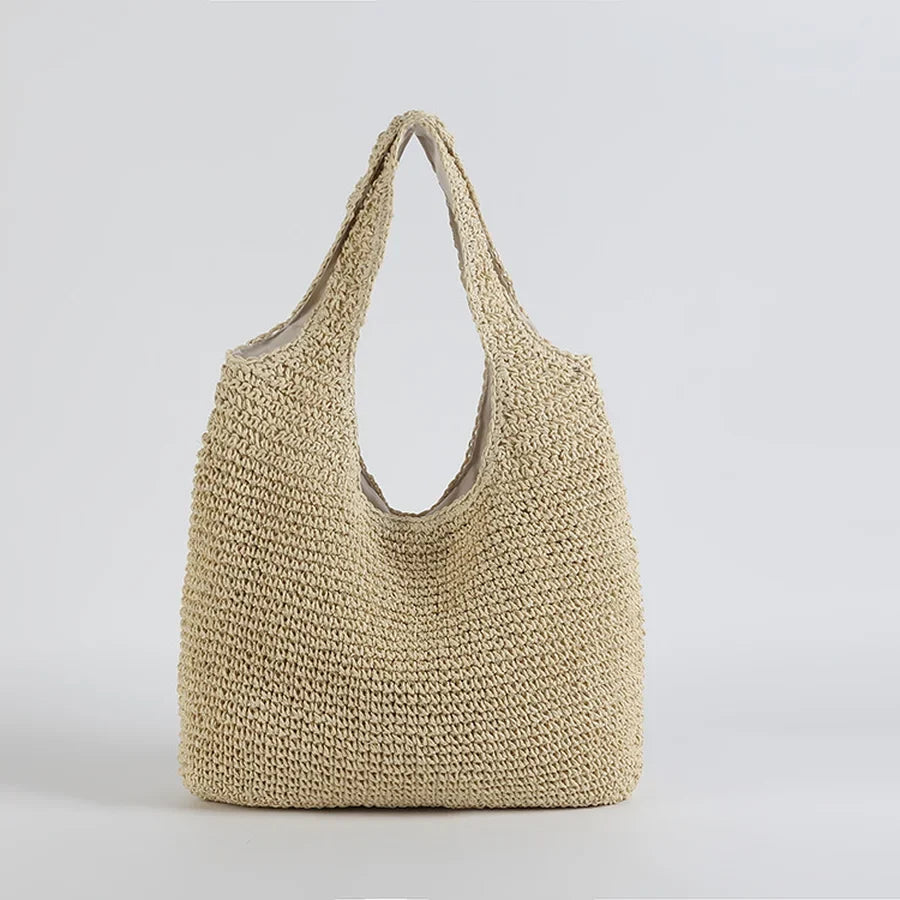 Borsa donna casual in paglia naturale, perfetta per la spiaggia e come accessorio estivo moda mare.