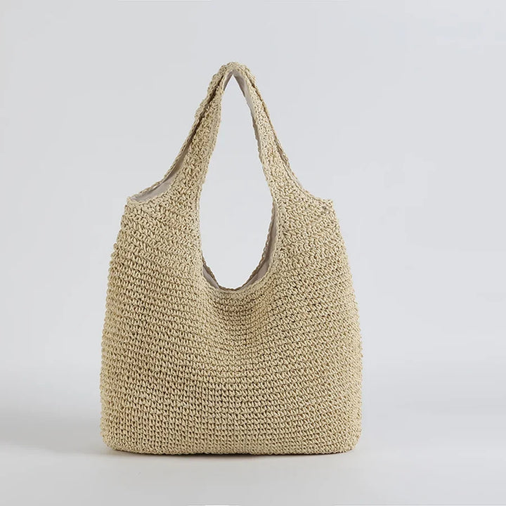 Borsa donna casual in paglia naturale, perfetta per la spiaggia e come accessorio estivo moda mare.