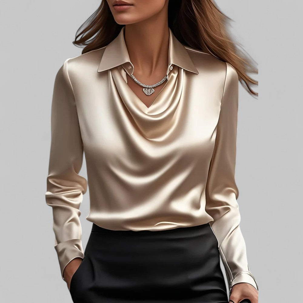 Blusa satinata elegante da donna, collo drappeggiato, maniche lunghe. Capo versatile e alla moda.