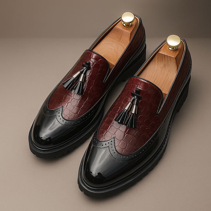 Mocassini uomo con finitura coccodrillo e nappine, calzature eleganti e versatili, ideali per un look formale maschile.