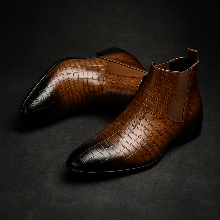 Versatili stivaletti uomo slip-on alla caviglia in effetto pelle di serpente per ogni outfit invernale.