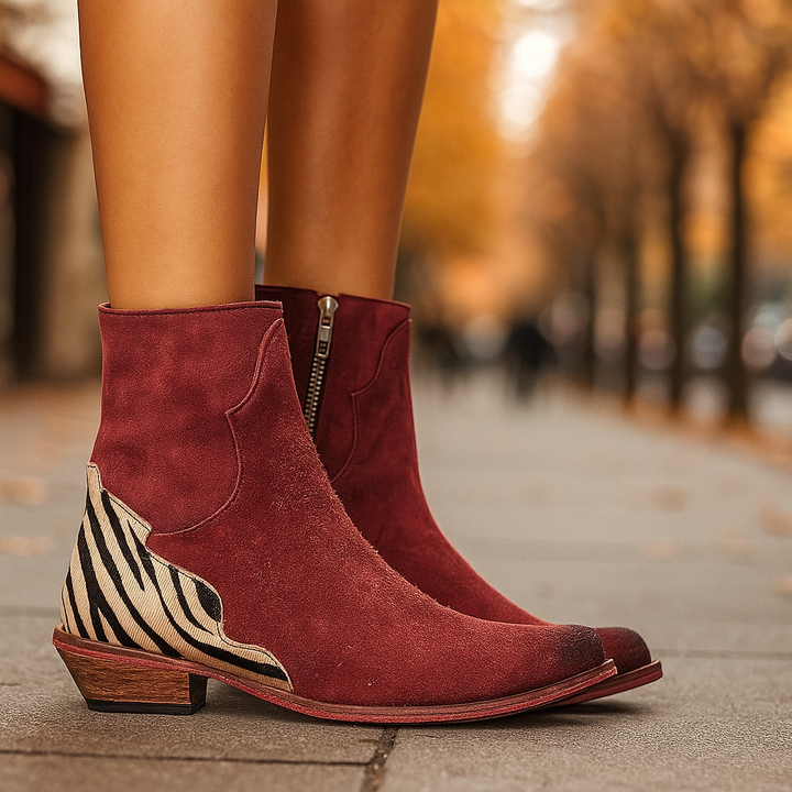 Stivaletti donna con tacco basso, eleganti e comodi. Ideali per la moda donna e il comfort quotidiano invernale.