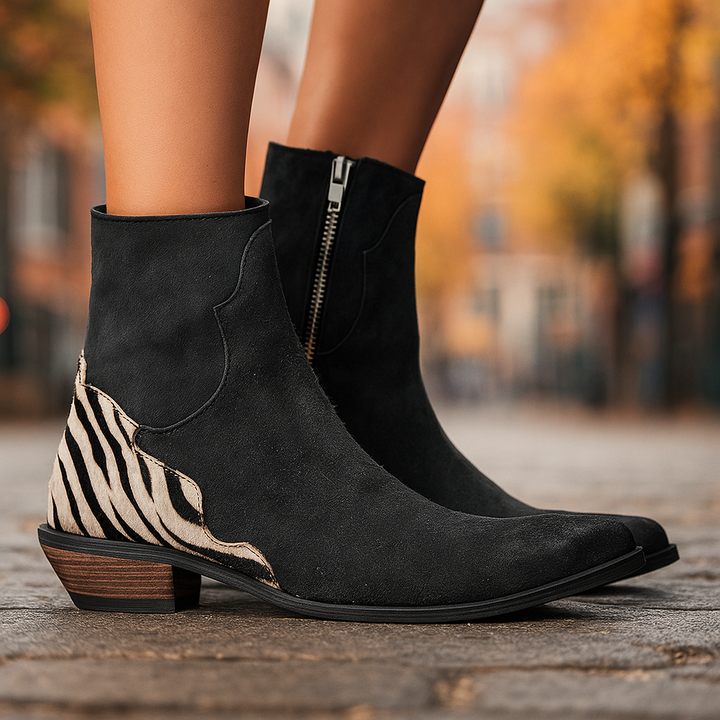 Stivaletti donna con tacco basso, eleganti per moda invernale. Soletta ammortizzata per massimo comfort quotidiano.
