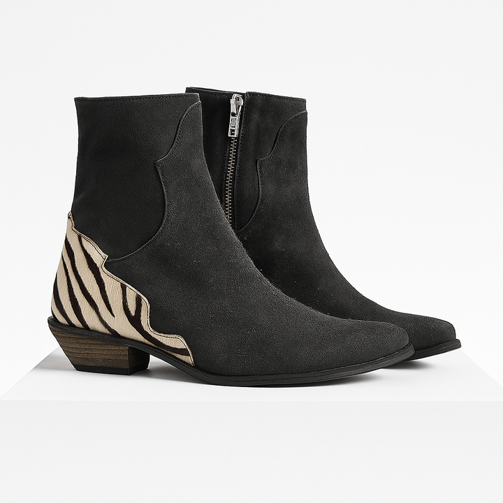 Stivaletti a blocco donna eleganti con tacco basso. Moda invernale e comfort assicurato per ogni giorno.